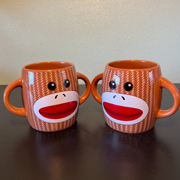 Set of 2 Knitted Sock Monkey Ceramic Dual Handled, Double Sided Mugs - GALERIE - Picture 2 of 7